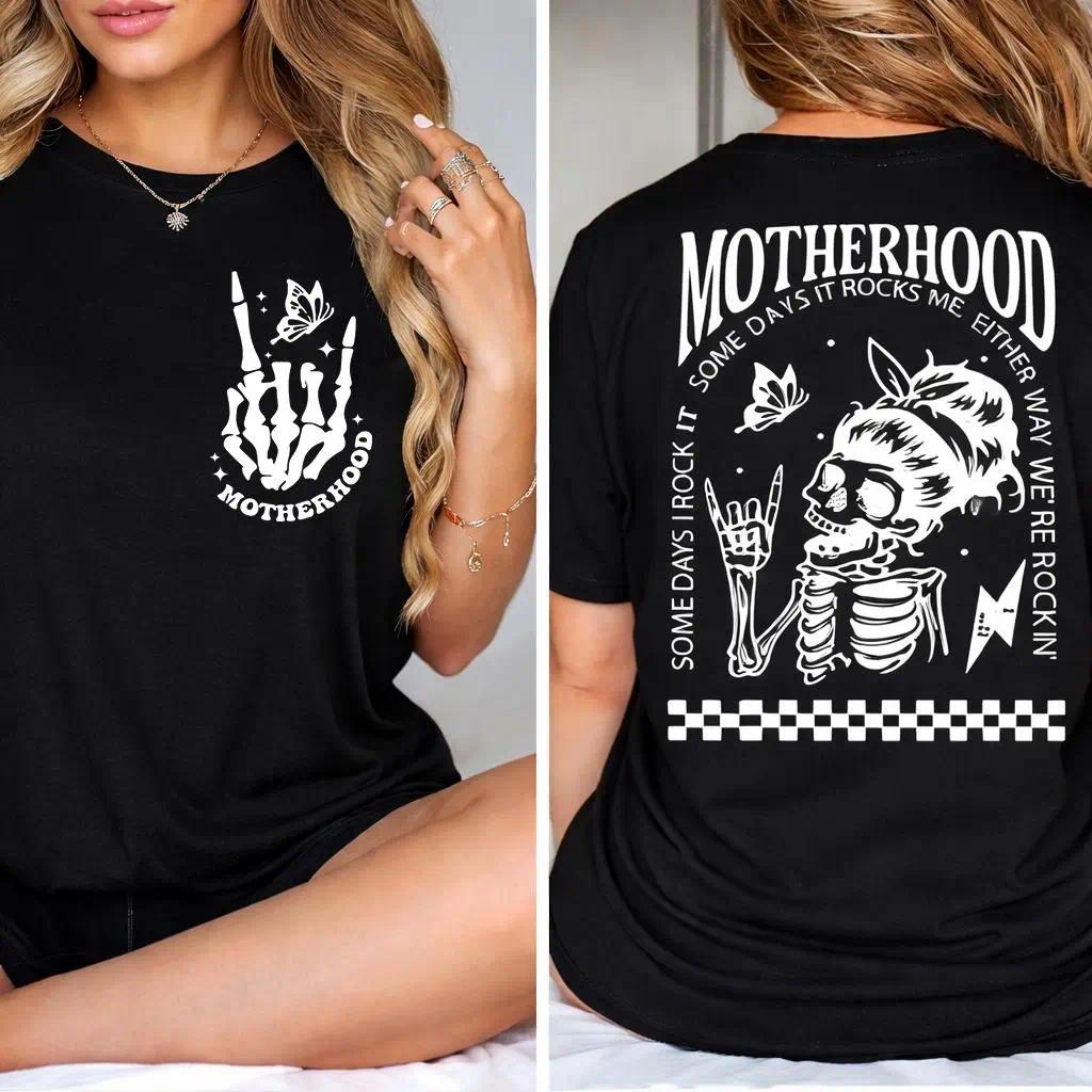 "Motherhood: Sometimes I Rock It, Sometimes It Rocks Me" shirt – a perfect unisex cotton tee for moms, great for Mother's Day!