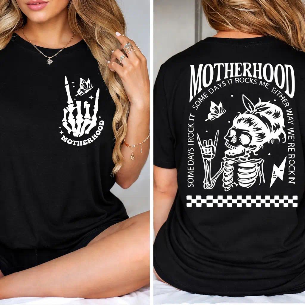 "Motherhood: Sometimes I Rock It, Sometimes It Rocks Me" shirt – a perfect unisex cotton tee for moms, great for Mother's Day!